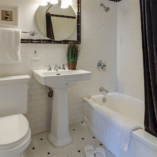 small bathroom with white tiles lincoln ne